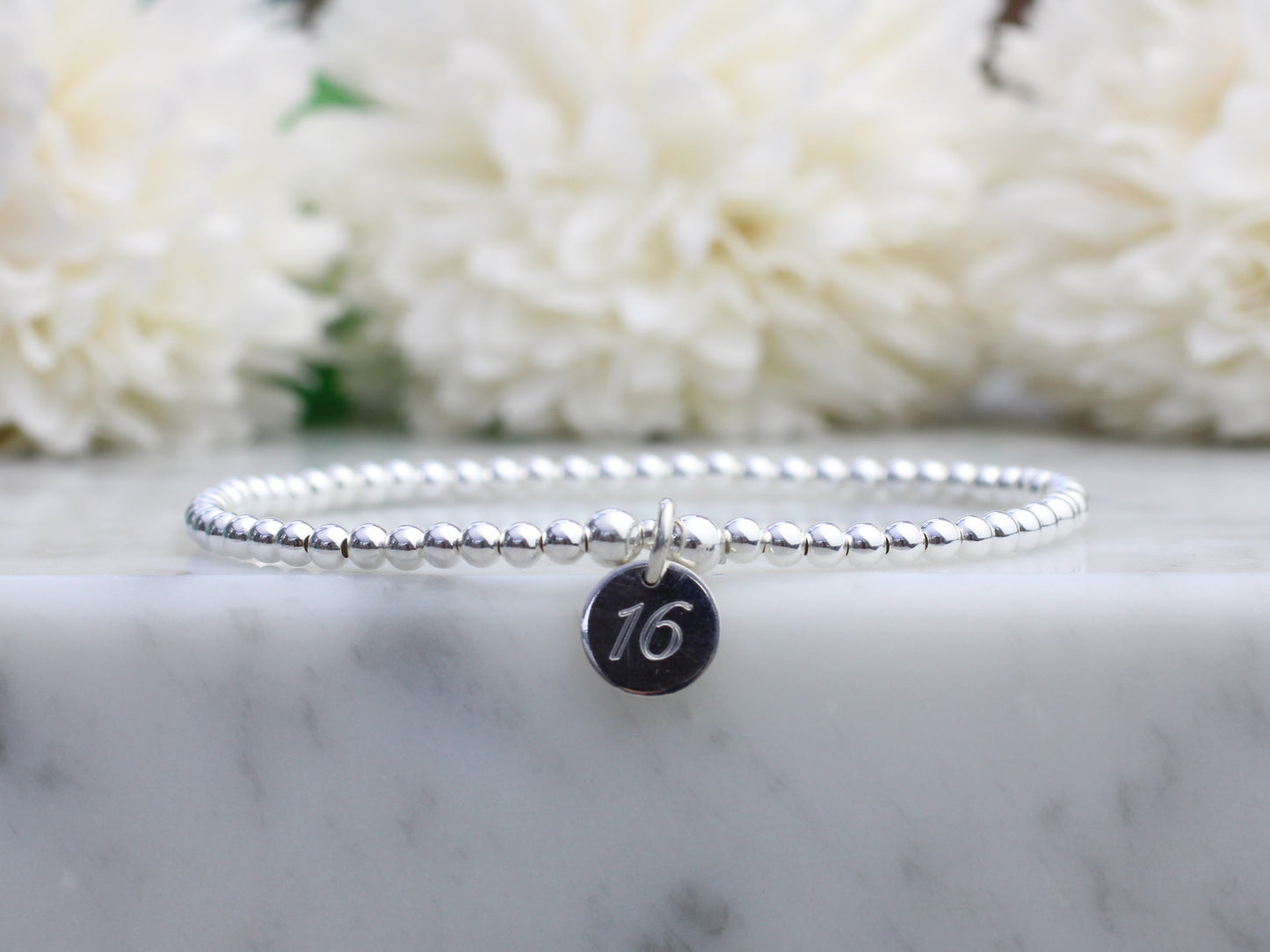 16th birthday bracelet in sterling silver.
