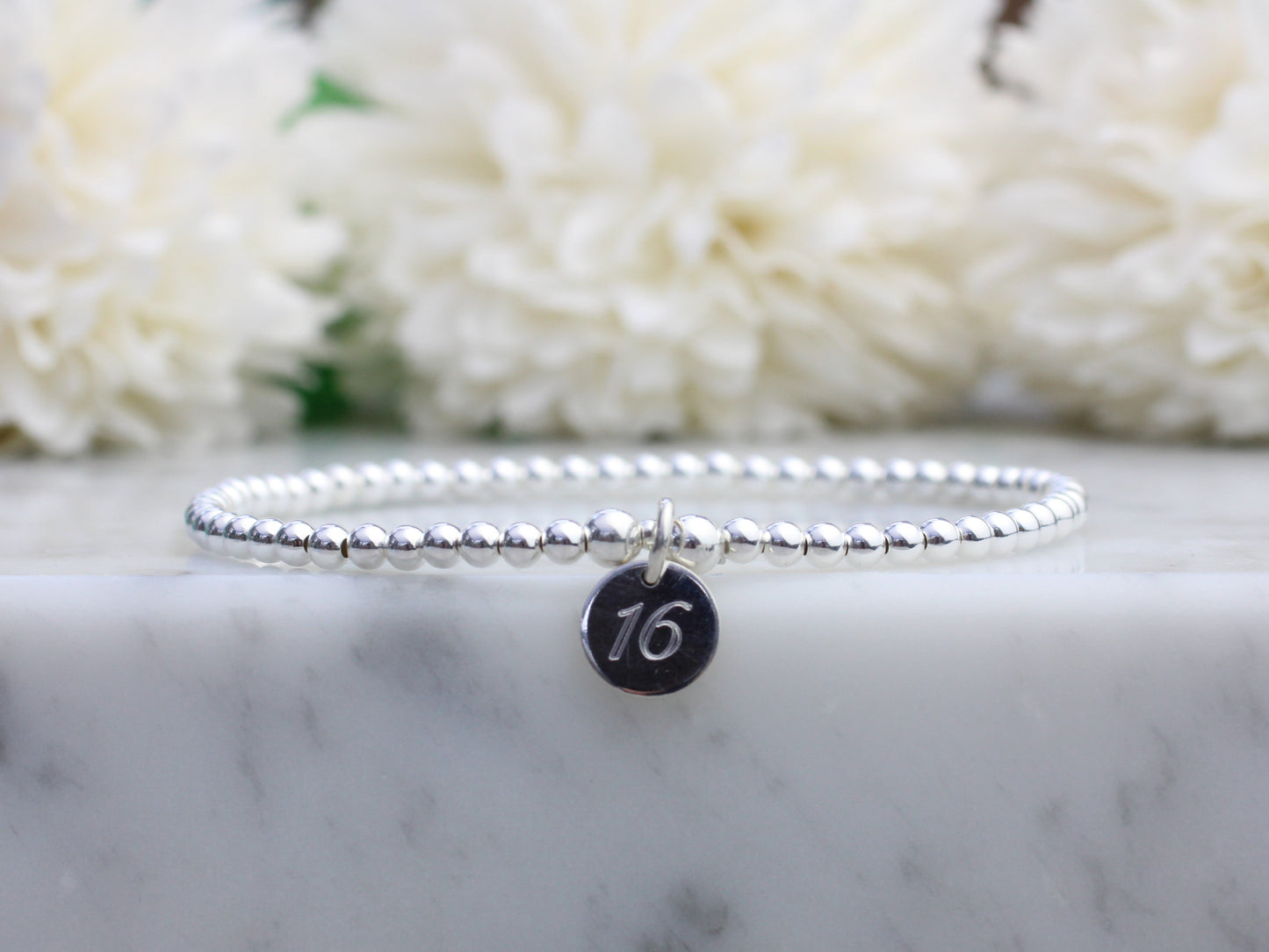 Birthday bracelet. Engrave on the front and back.