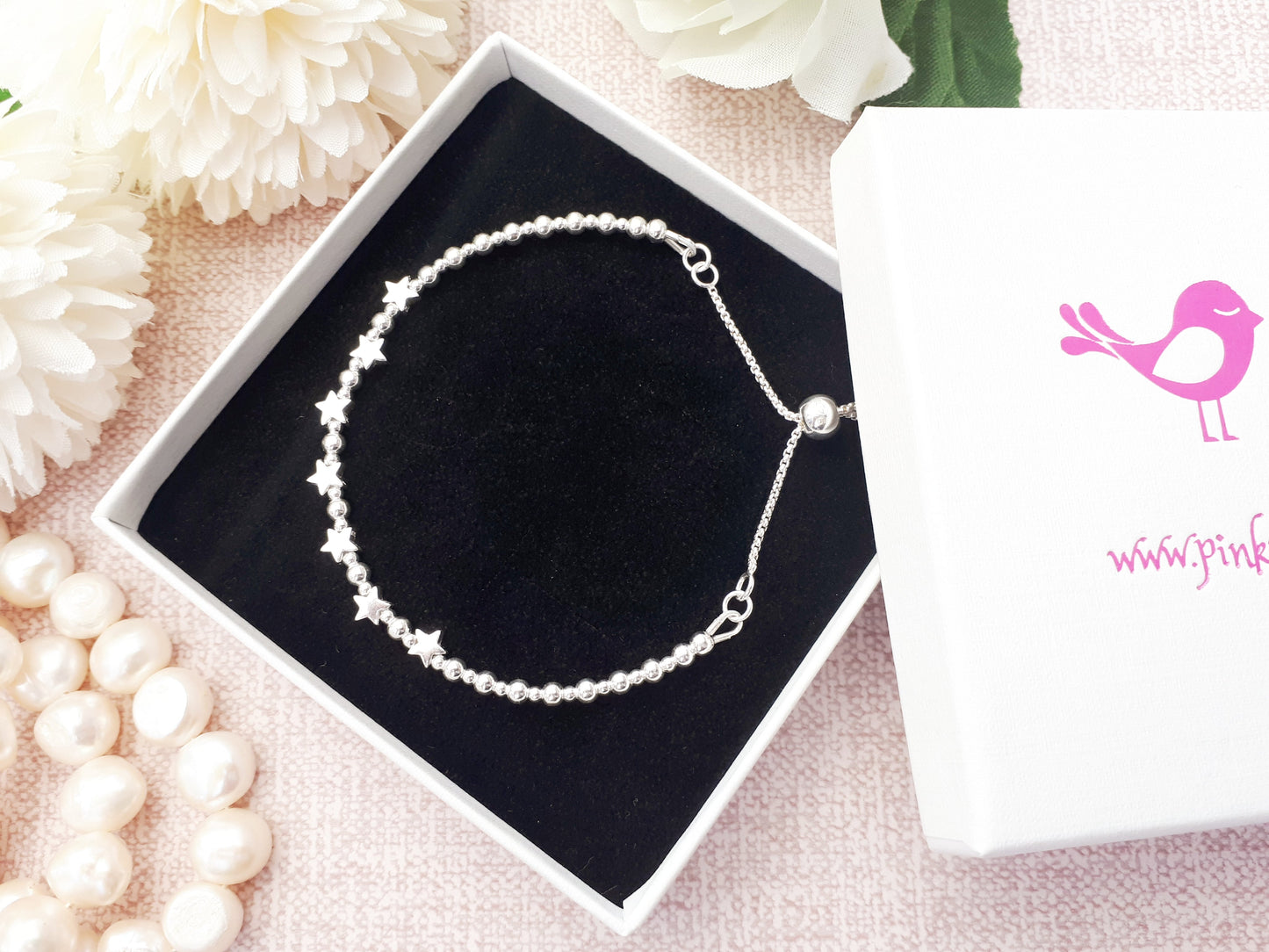 70th birthday bracelet. 70th birthday gift. Sterling silver star bracelet with slider clasp.