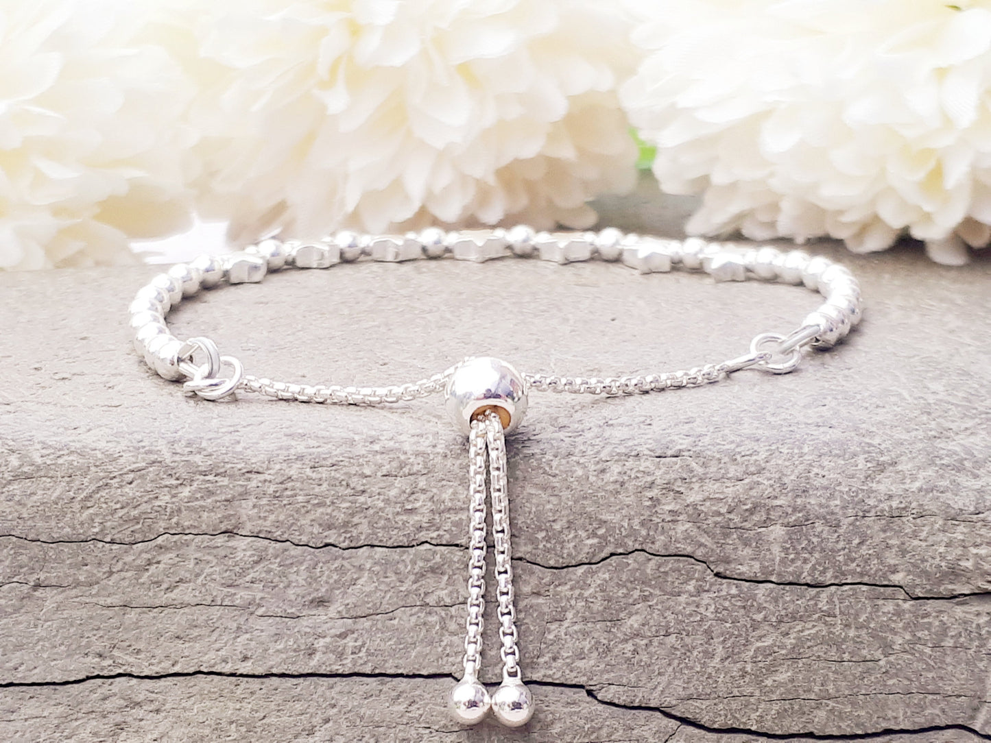 70th birthday bracelet. 70th birthday gift. Sterling silver star bracelet with slider clasp.