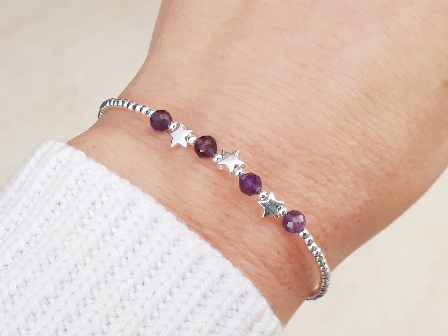 Star bracelet with amethyst gemstones.