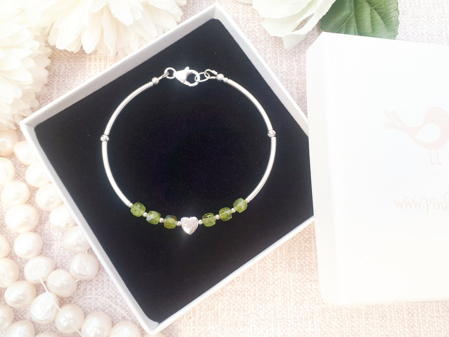 Peridot bracelet in silver. August birthday gift.