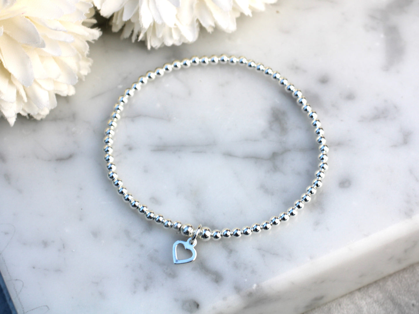 Open heart charm bracelet