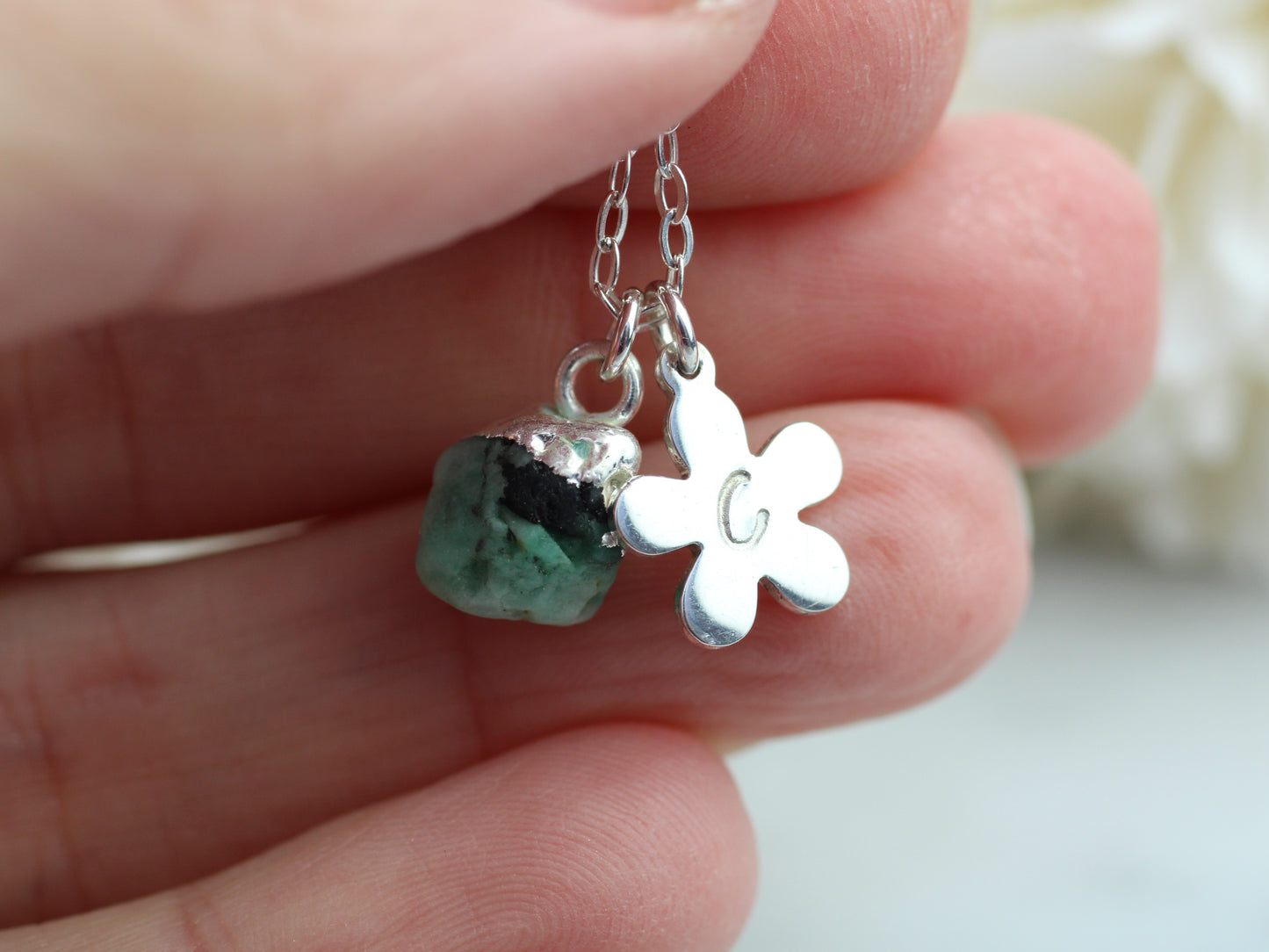 Personalised emerald necklace in silver.
