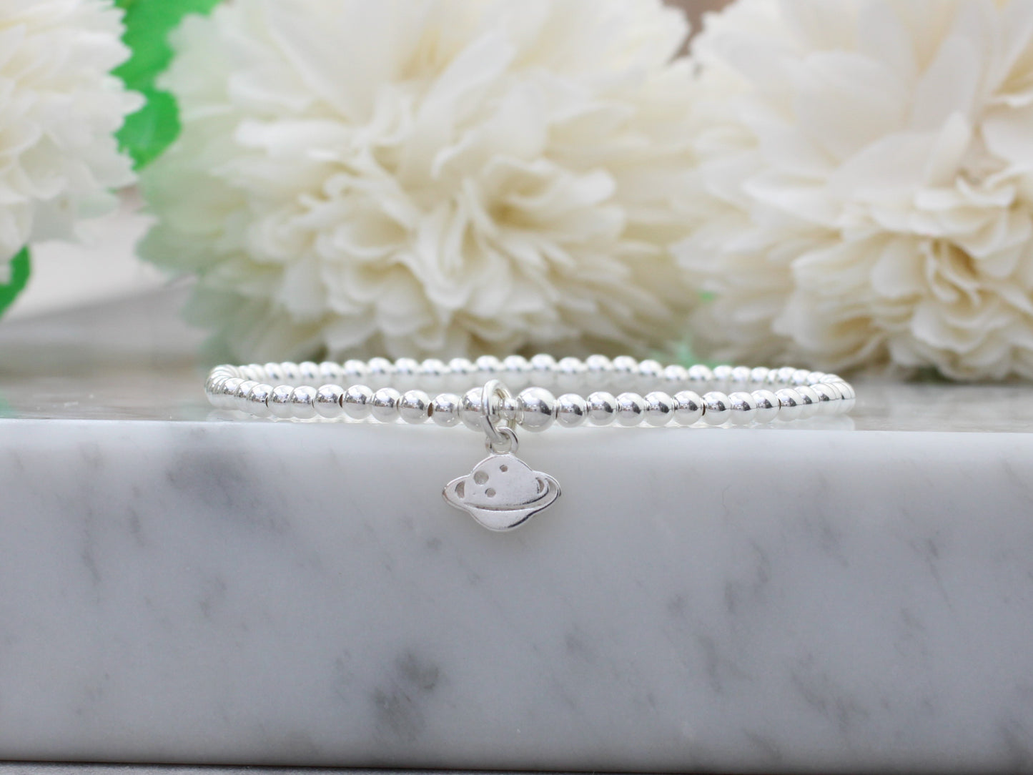 Planet charm bracelet.