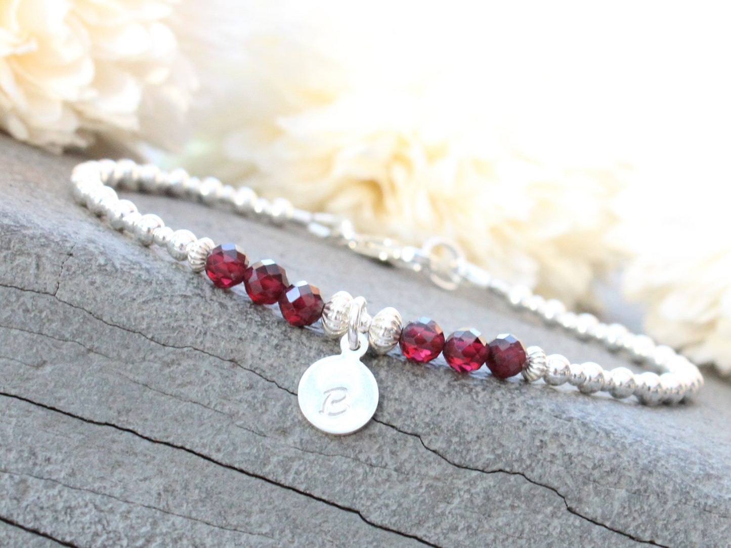 Initial and birthstone bracelet.