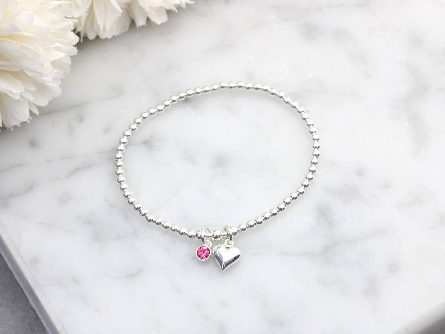 October birthstone charm bracelet.