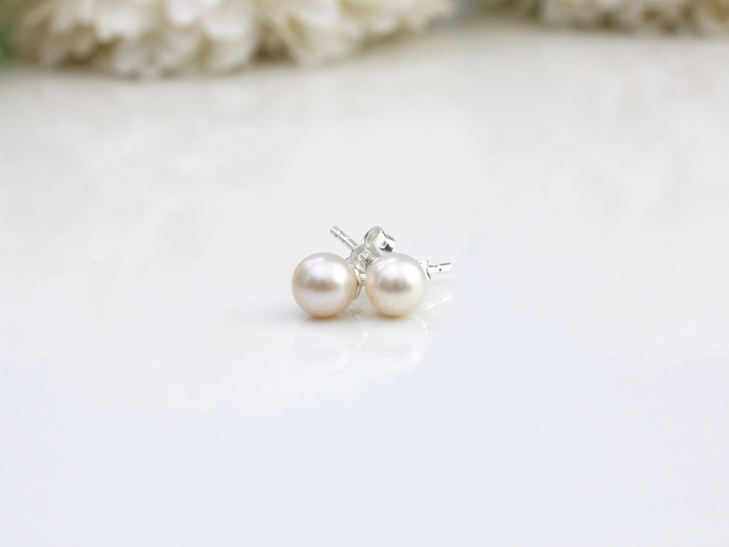 Silver pearl stud earrings. June birthstone.