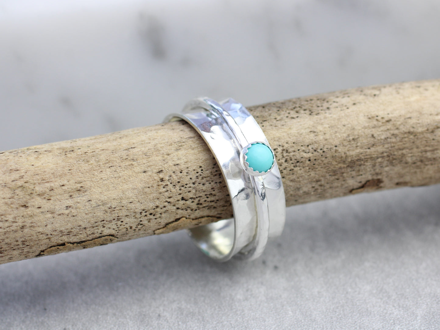 Birthstone spinner ring in sterling silver.