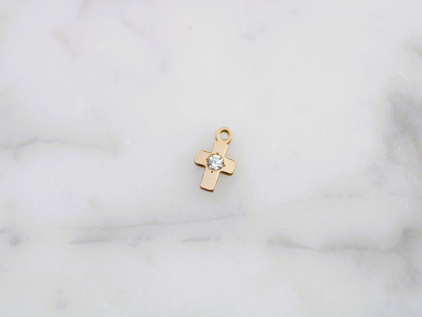 Gold filled cross charm.