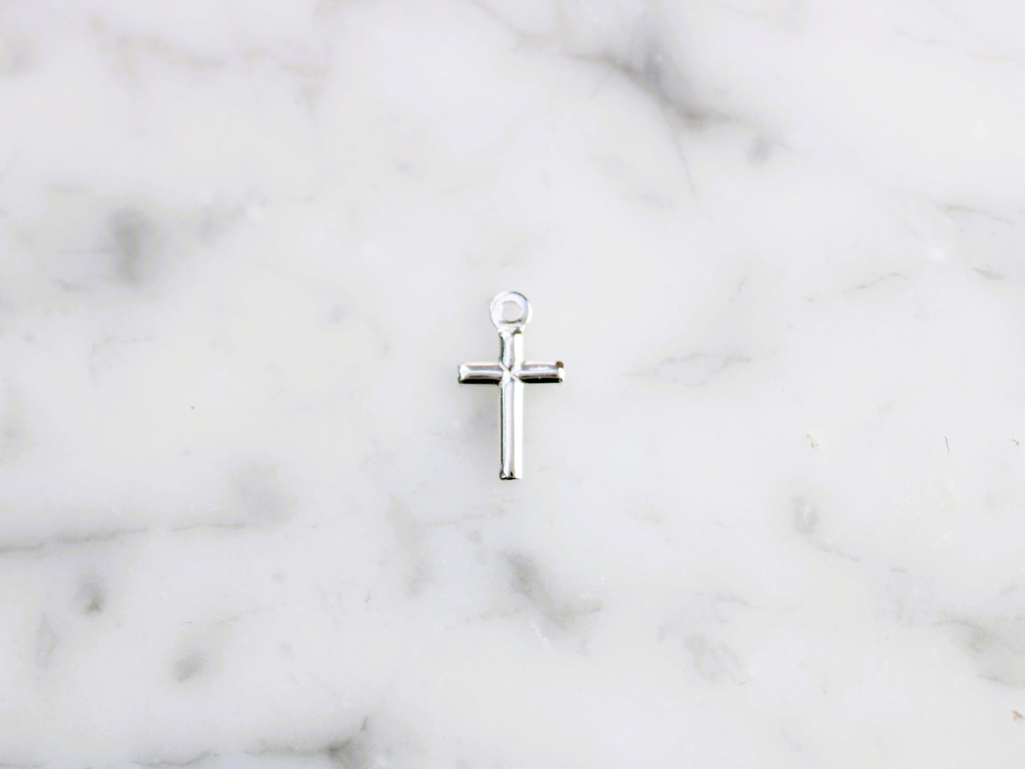 Cross charm