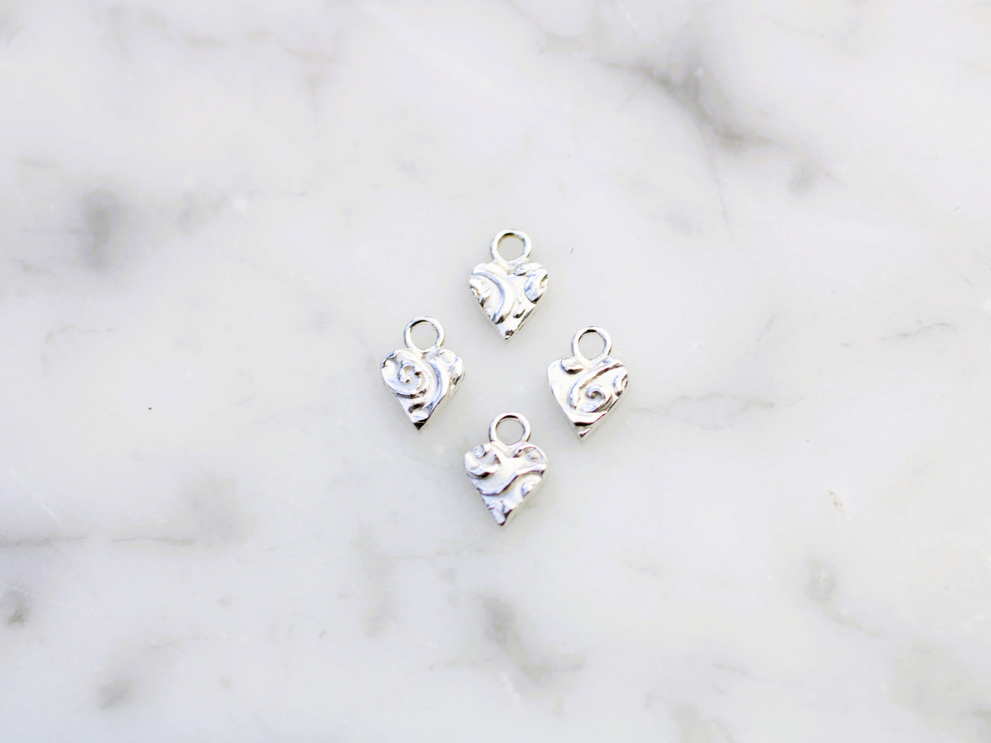 Handmade heart charm.
