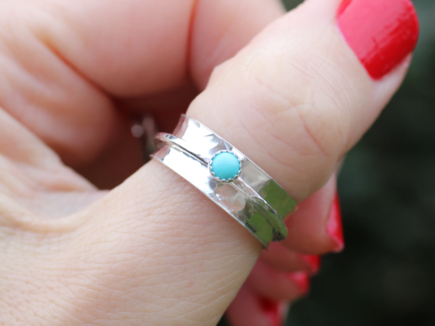 Birthstone spinner ring in sterling silver.