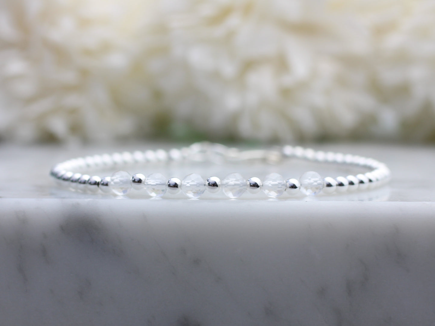 Quartz milestone bracelet in sterling silver.