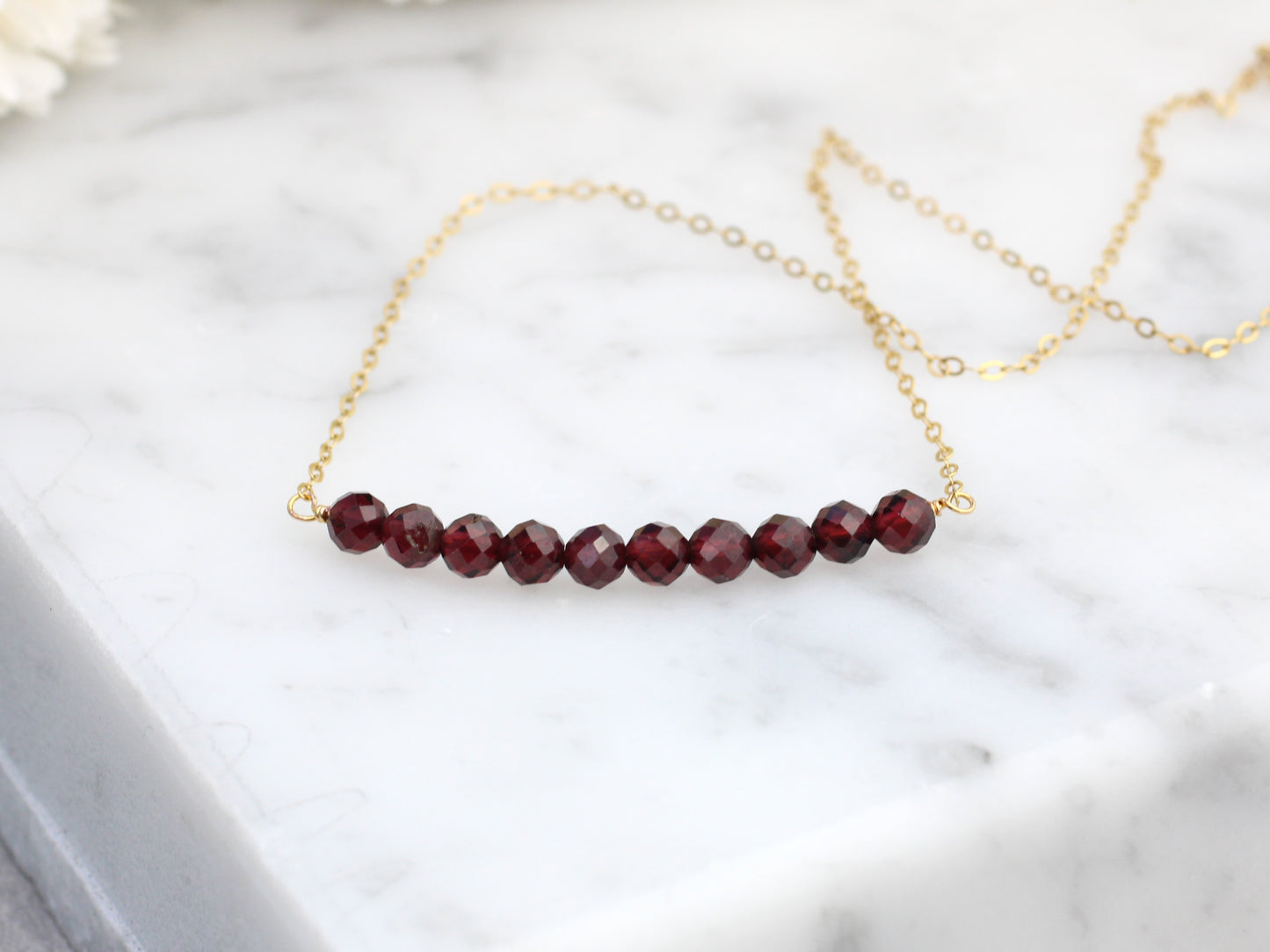 Garnet gemstone necklace in sterling silver or gold.