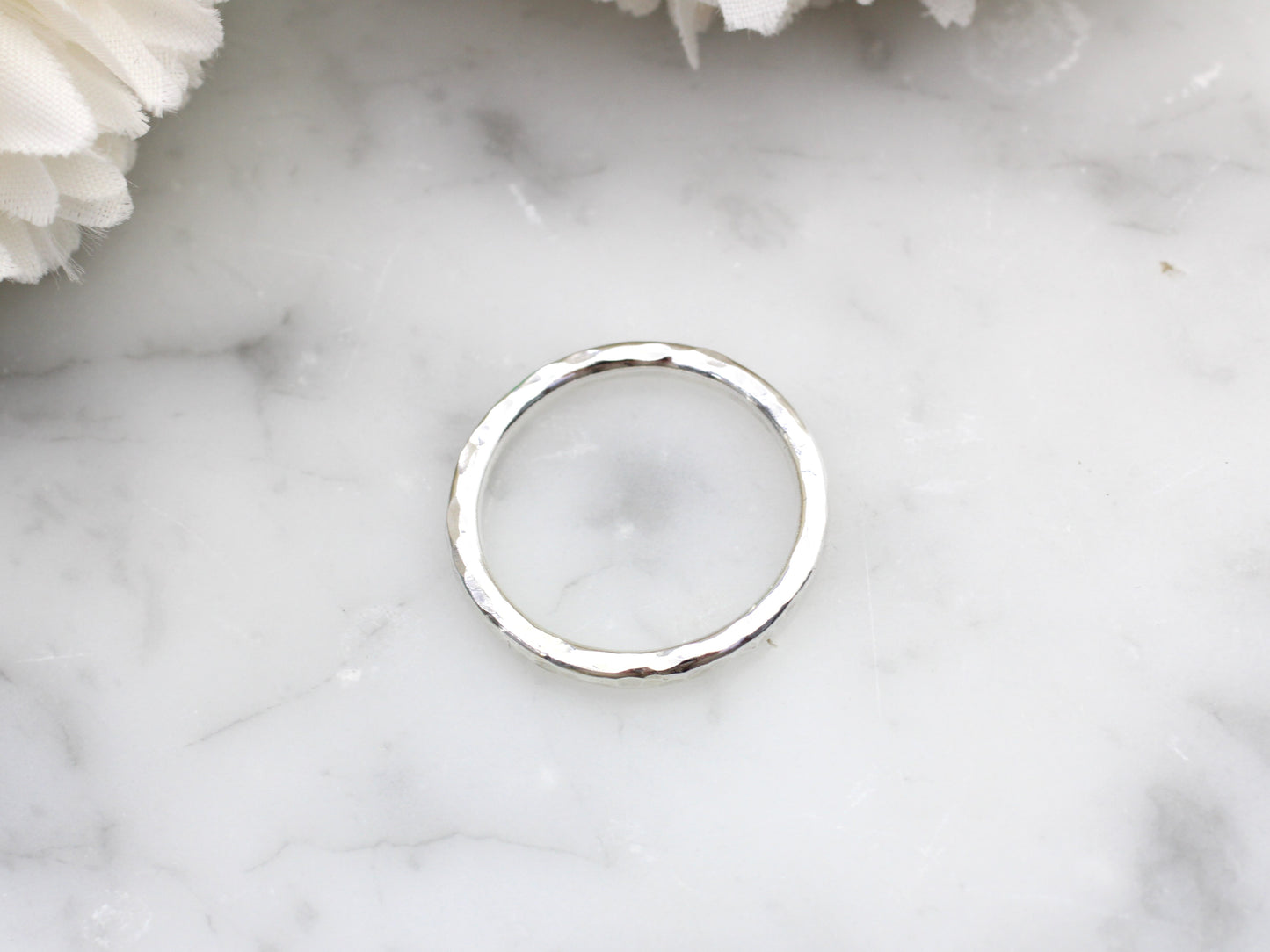 Hammered silver ring made with recycled sterling silver.