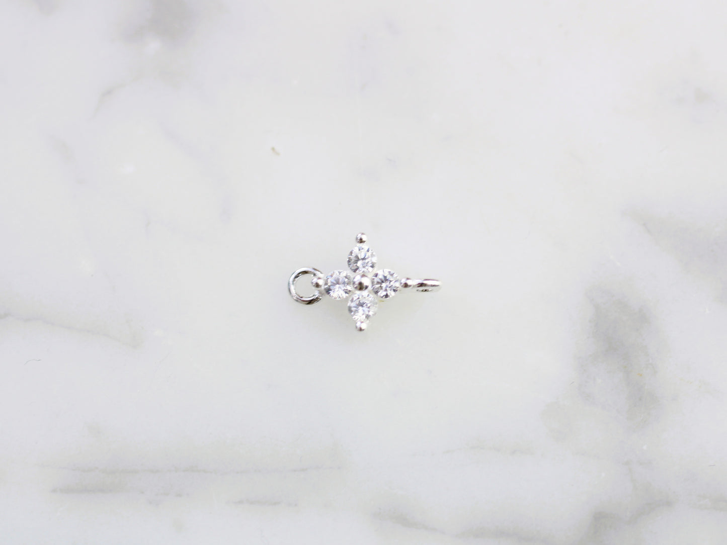 Sparkly flower connector.