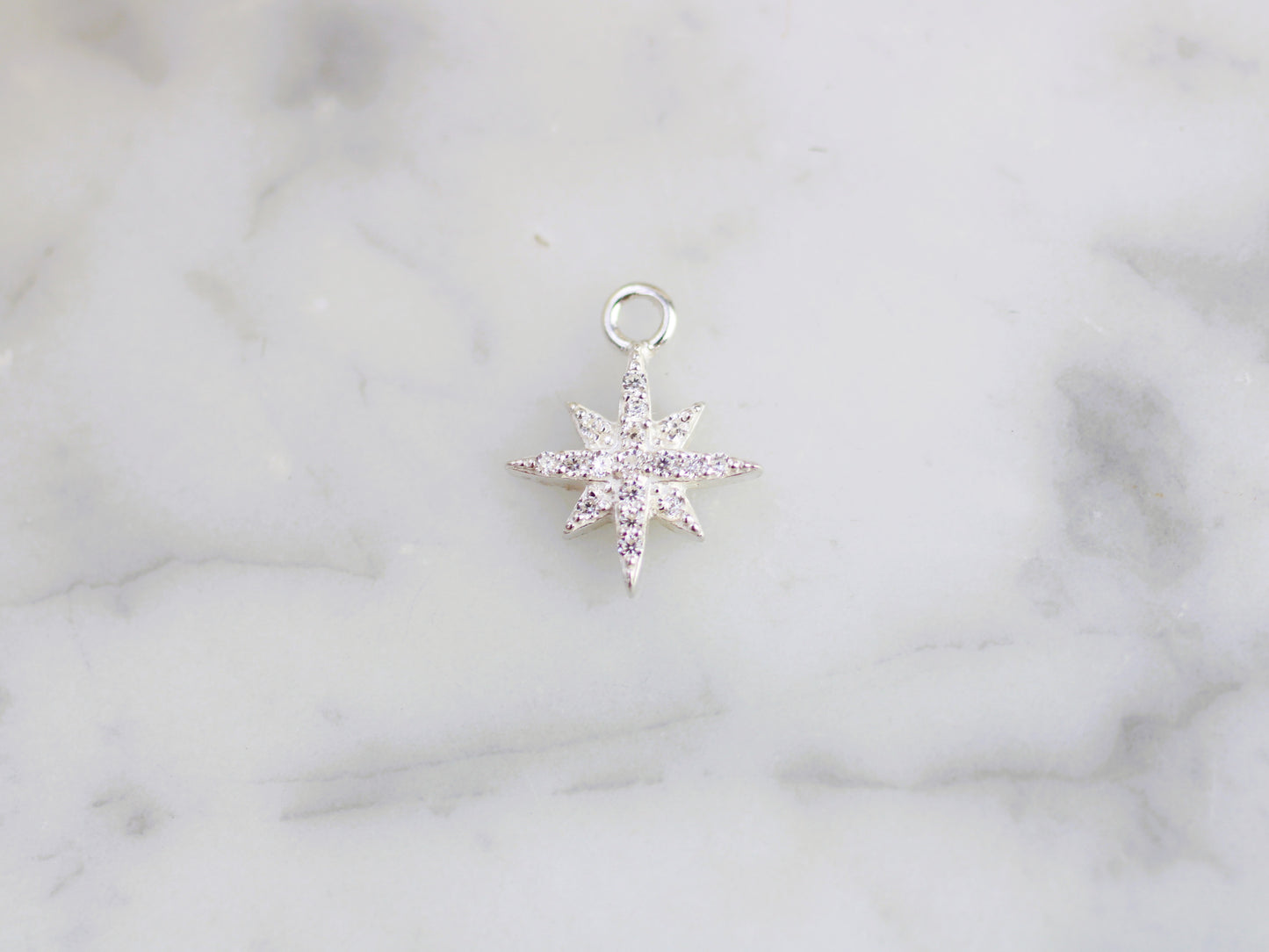 Sparkly North Star charm.