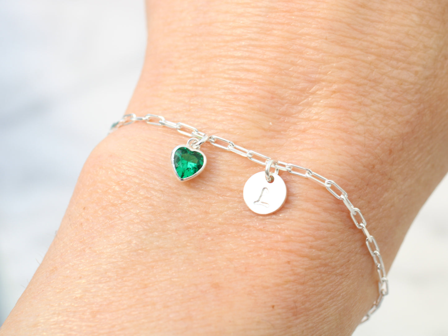 Personalised initial and birthstone adjustable bracelet in silver.