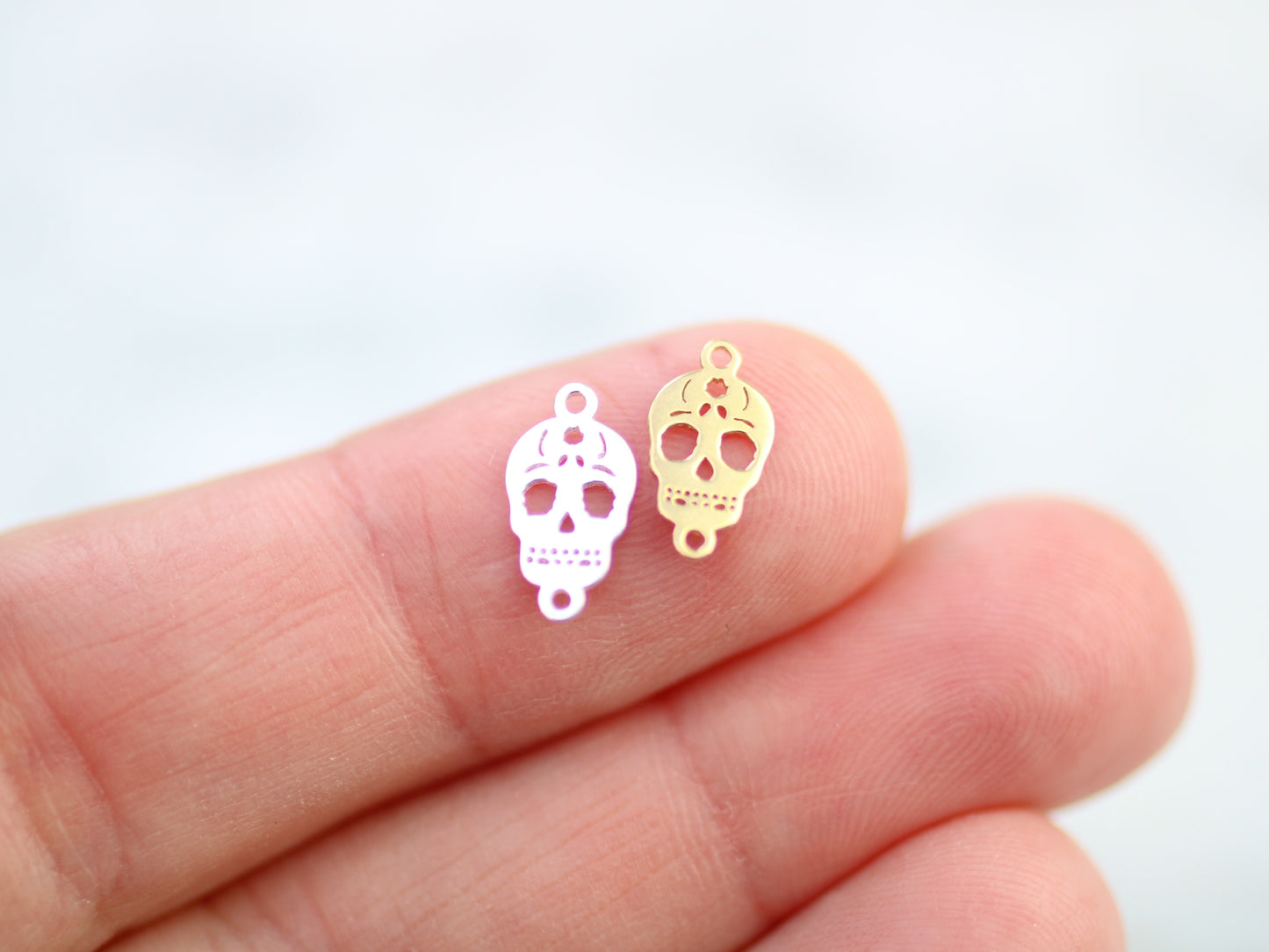 Skull connector in sterling silver or gold filled.