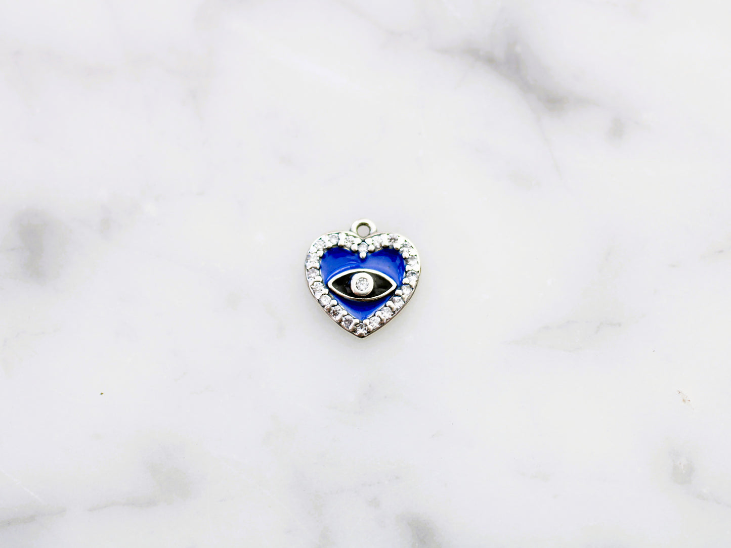Evil eye heart charm.