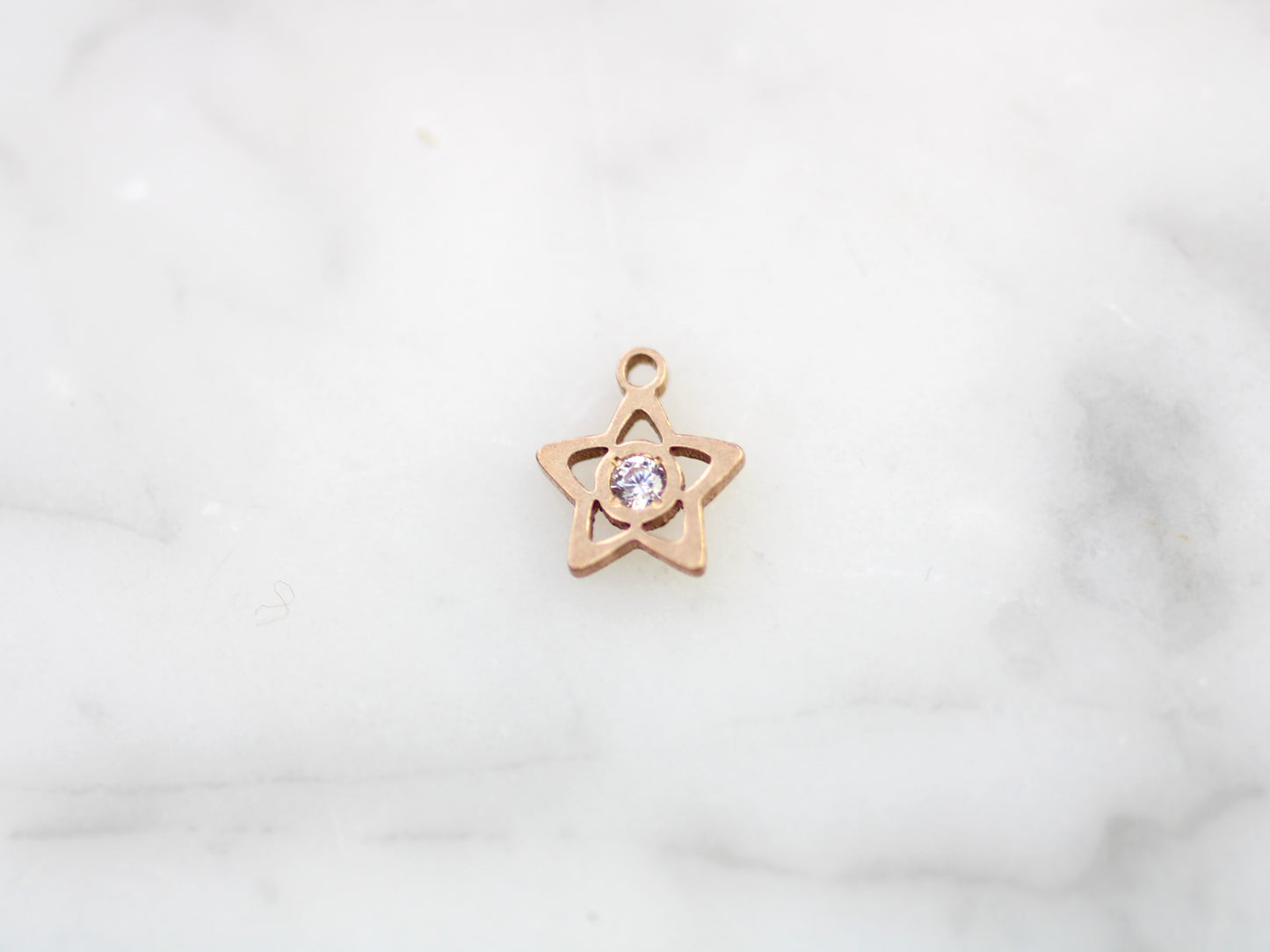 Gold filled star charm.