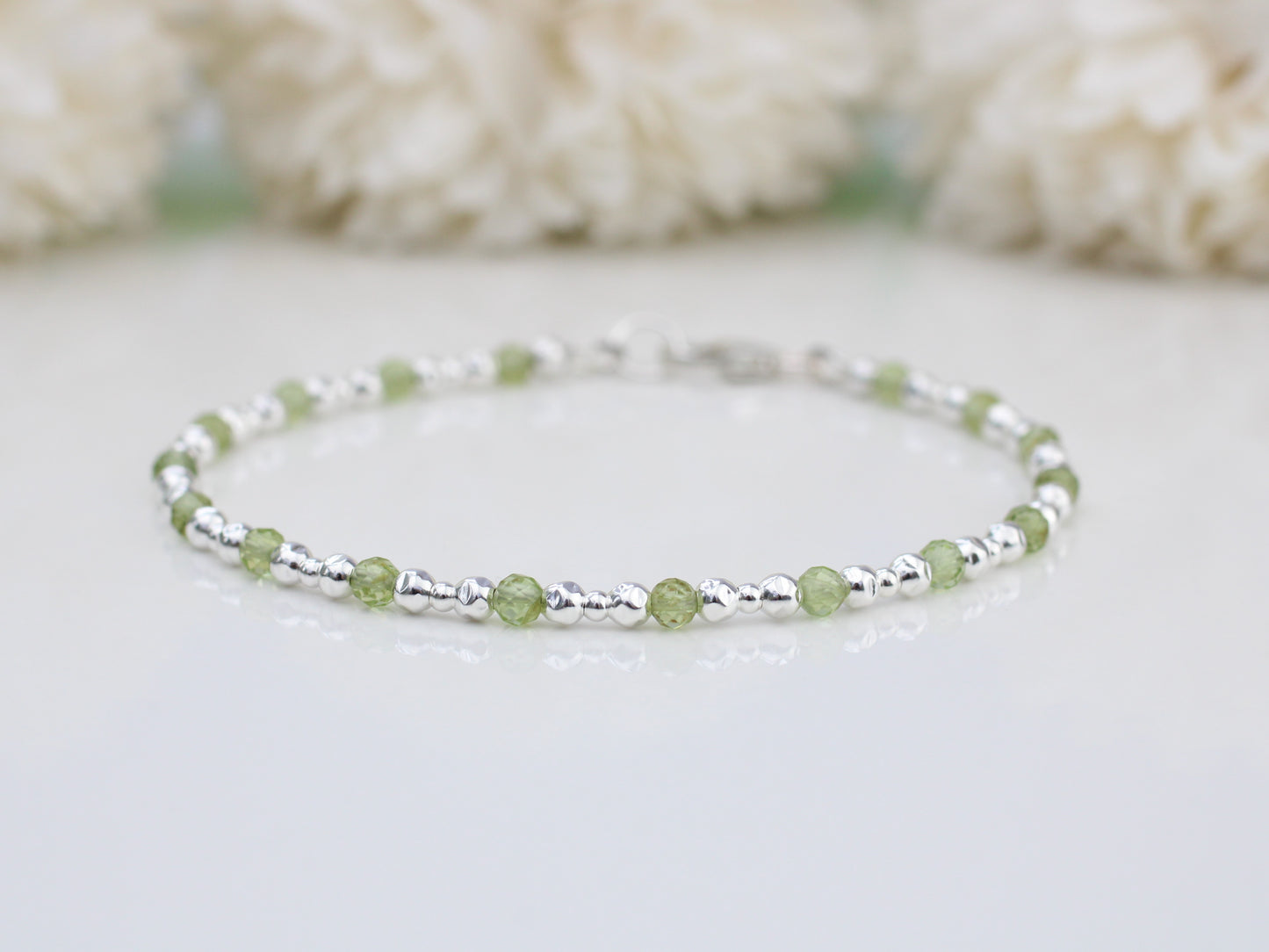 Natural peridot bracelet in silver.