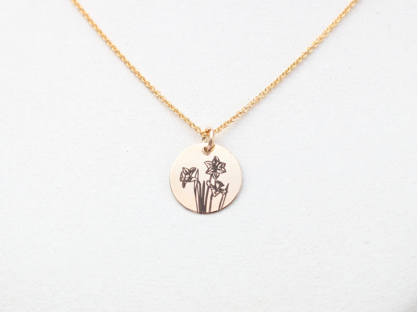 Daffodil necklace in silver or gold.