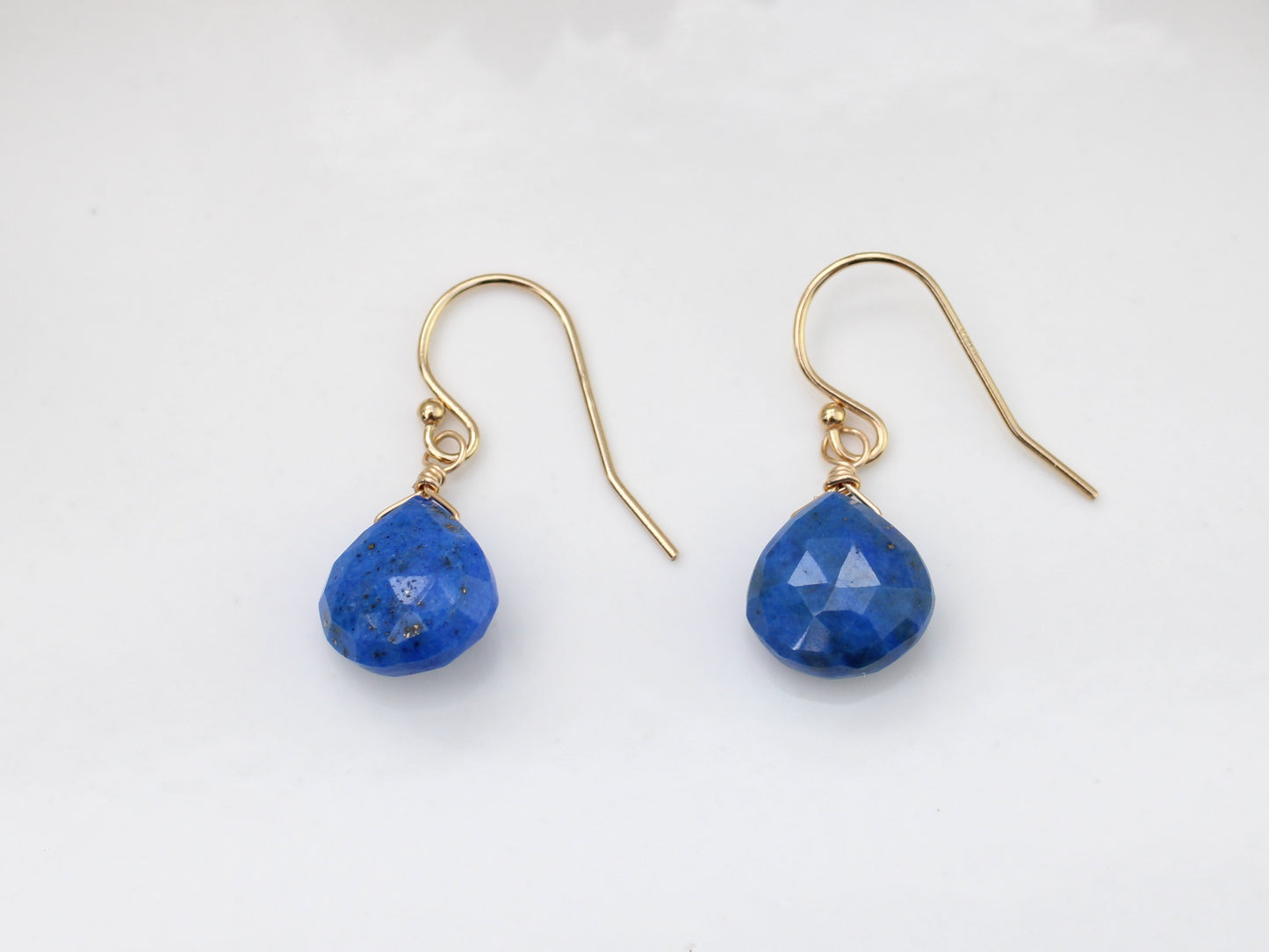 Lapis lazuli earrings in silver and gold.