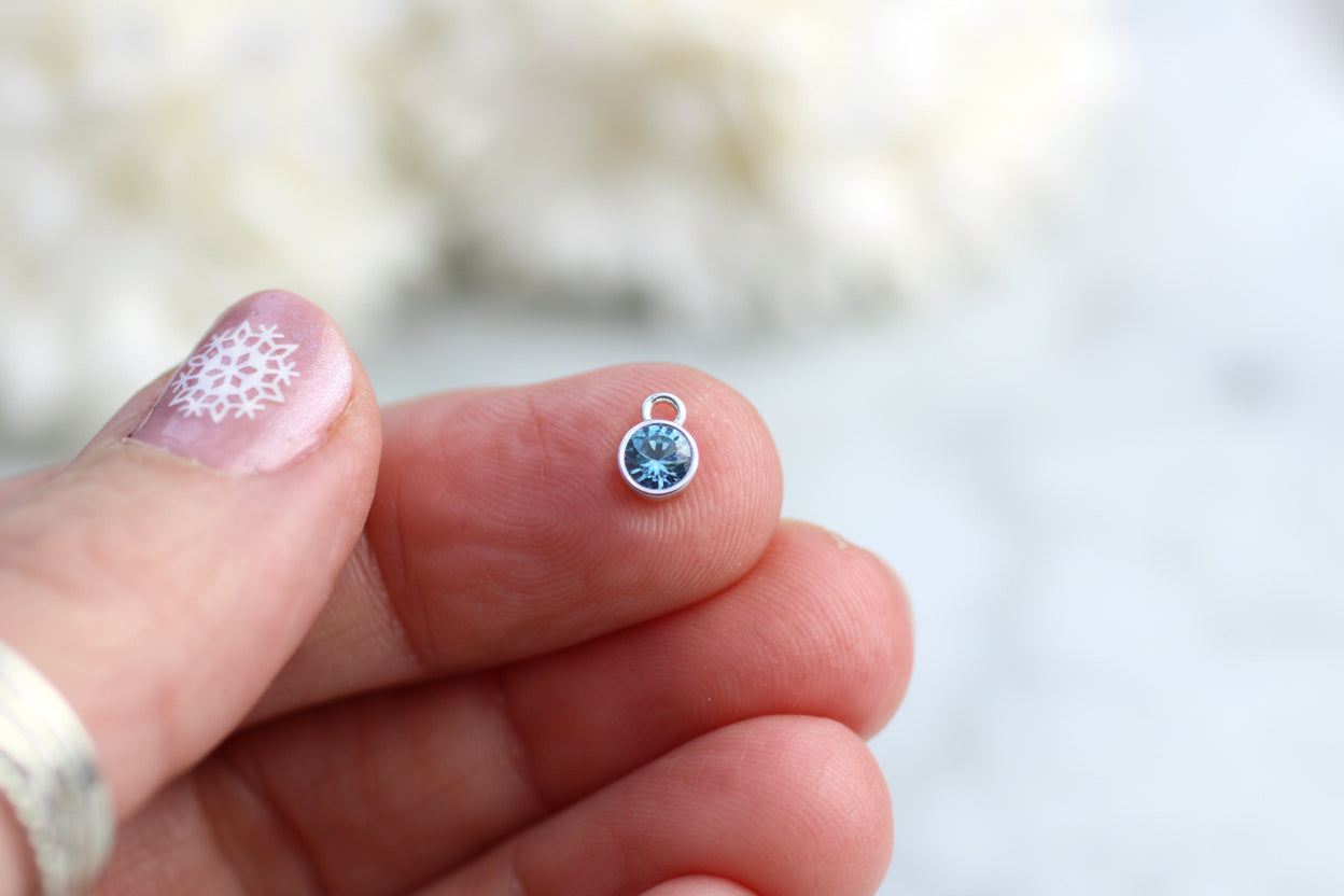 Birthstone charm in sterling silver.