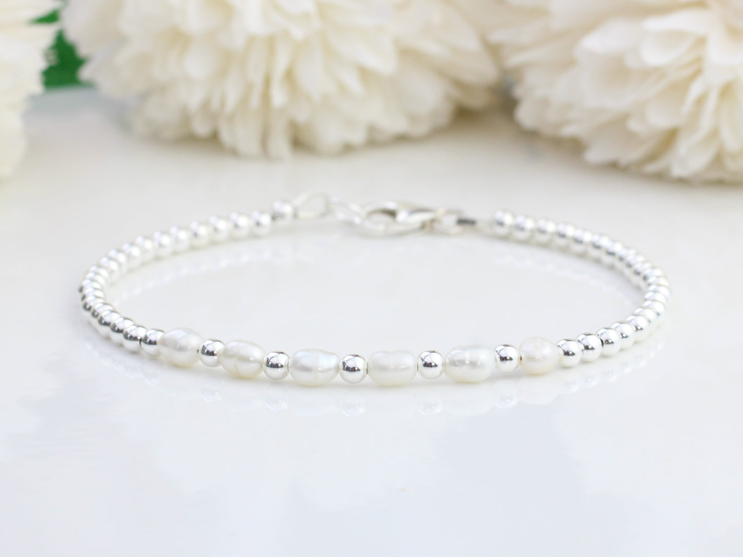 Freshwater pearl milestone bracelet.