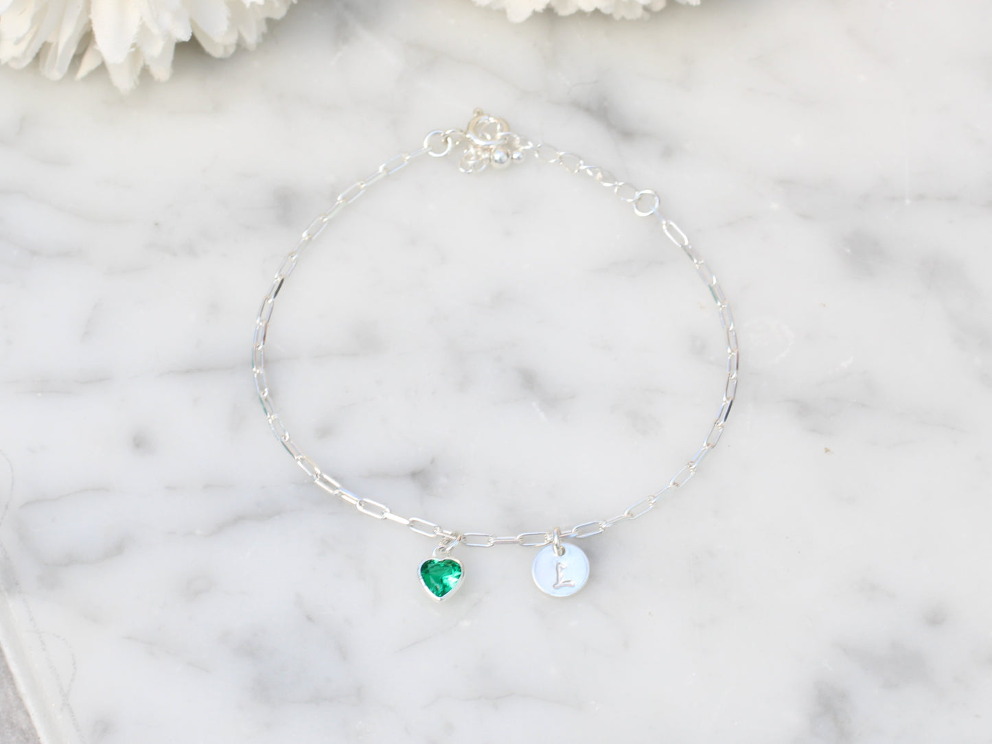 Personalised initial and birthstone adjustable bracelet in silver.