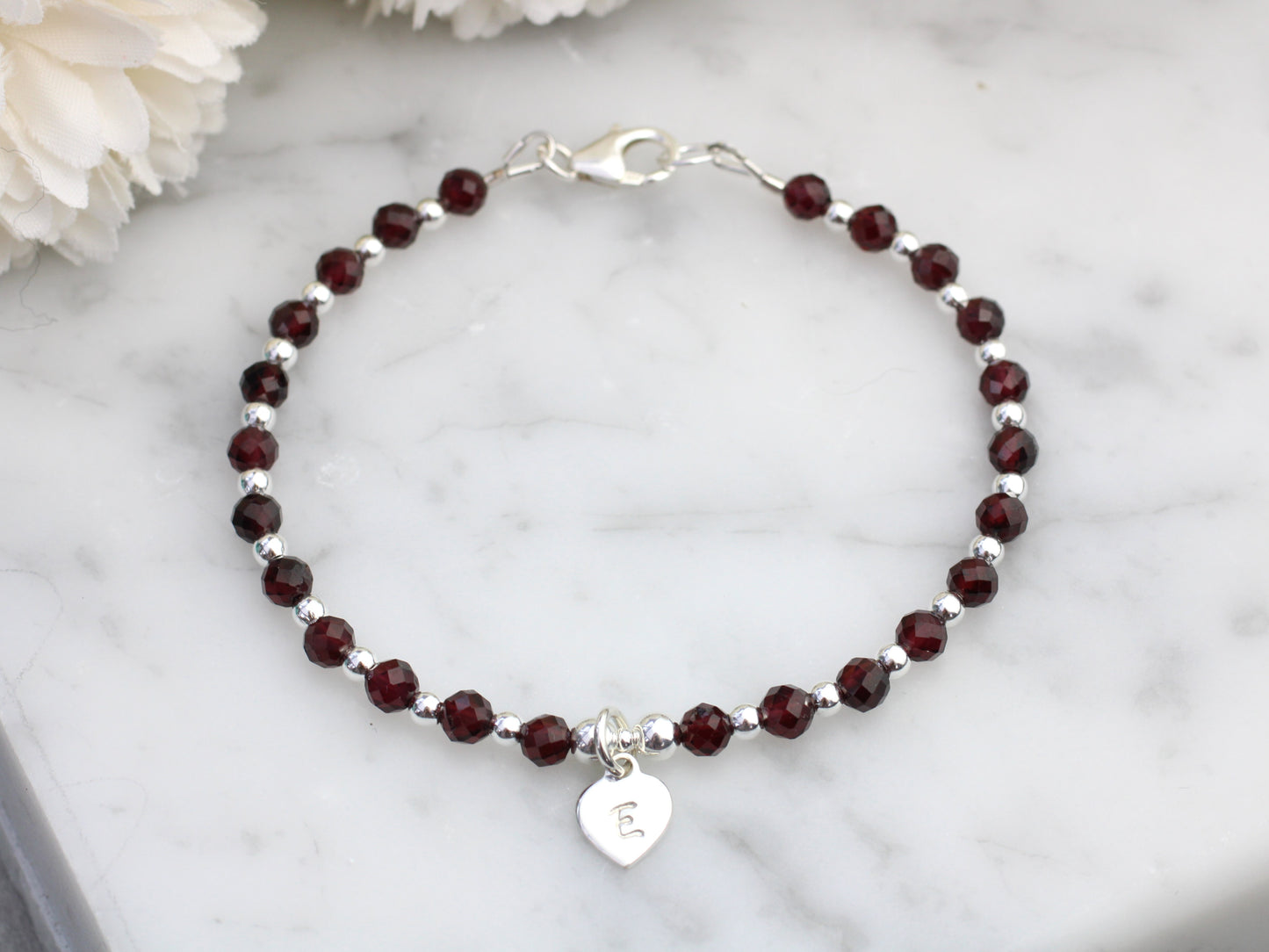 Garnet initial bracelet.