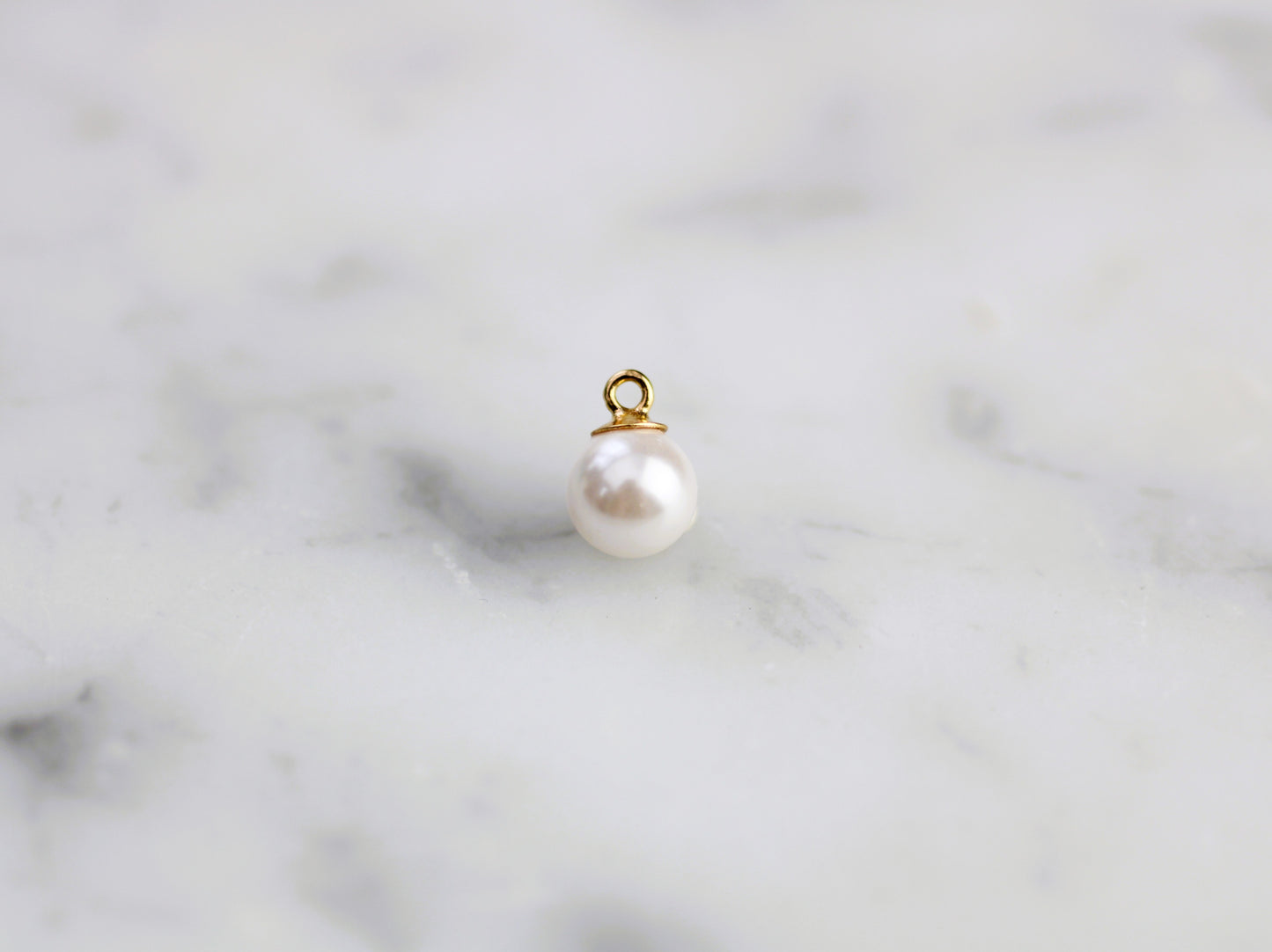 Gold filled faux pearl charm.