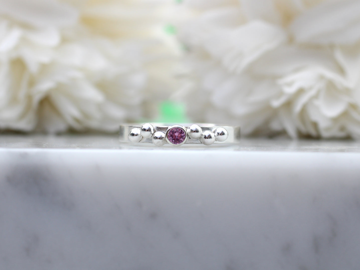 Pink sapphire and granulation ring. September birthstone.