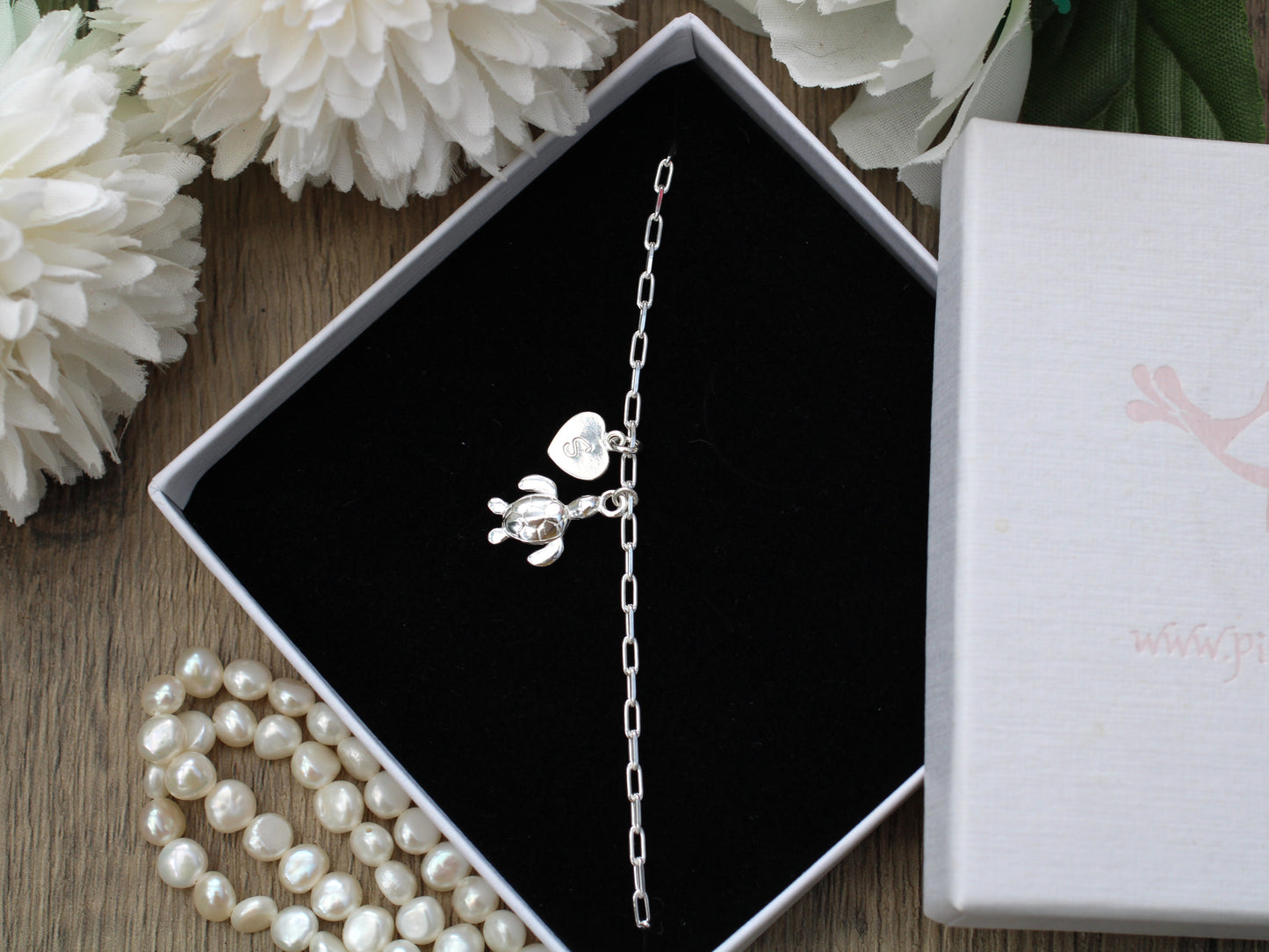 Personalised turtle bracelet in sterling silver.