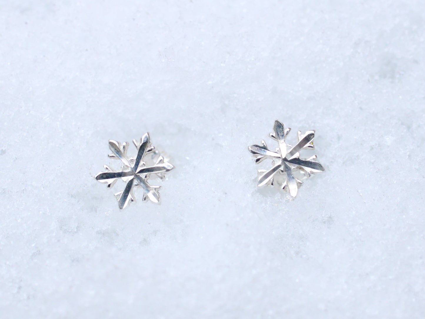 Snowflake stud earrings.