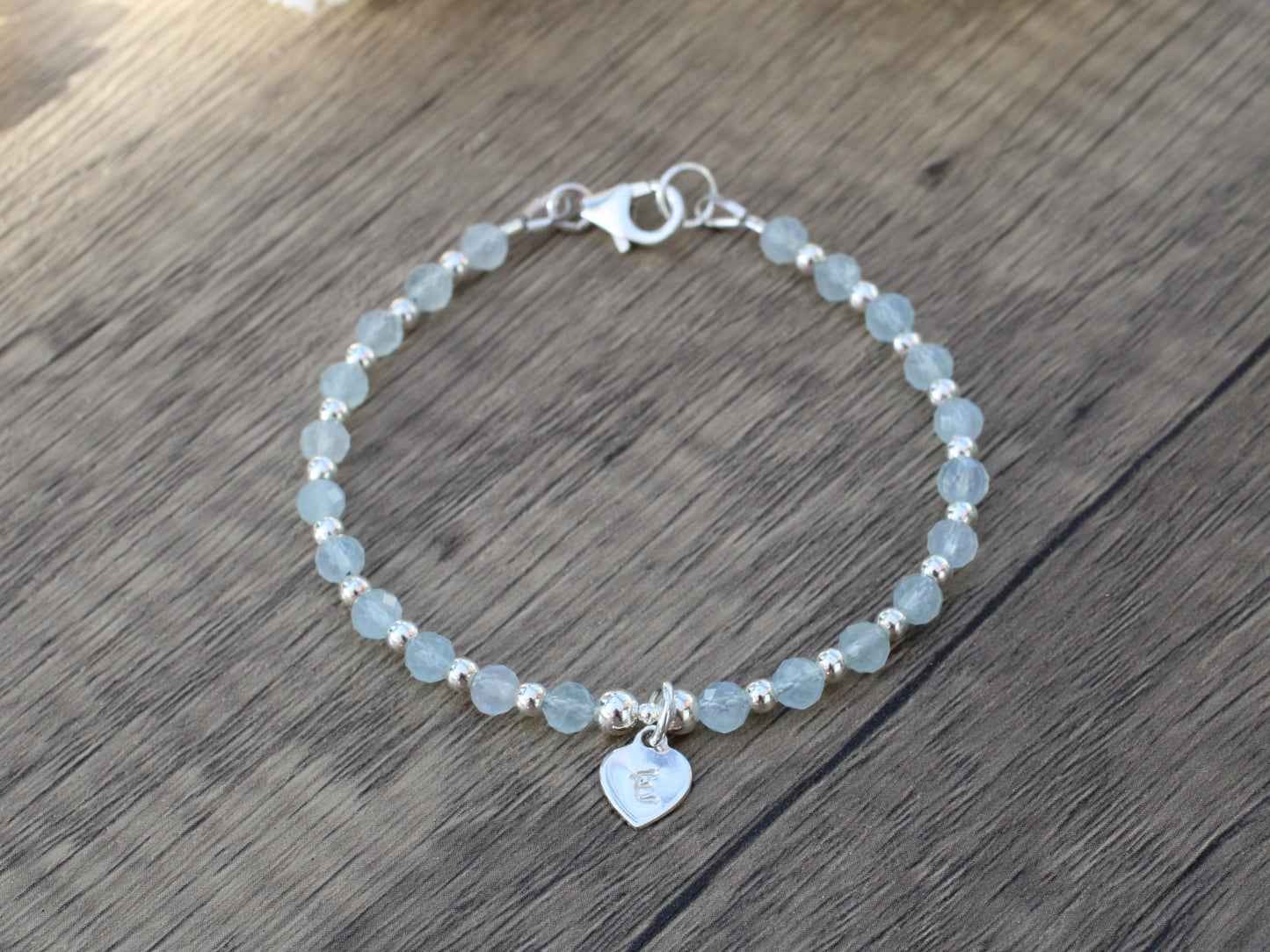 Aquamarine initial bracelet. March birthstone bracelet.