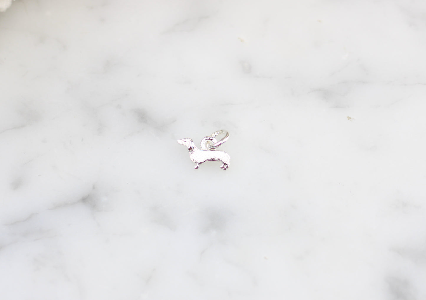 Dachshund charm.