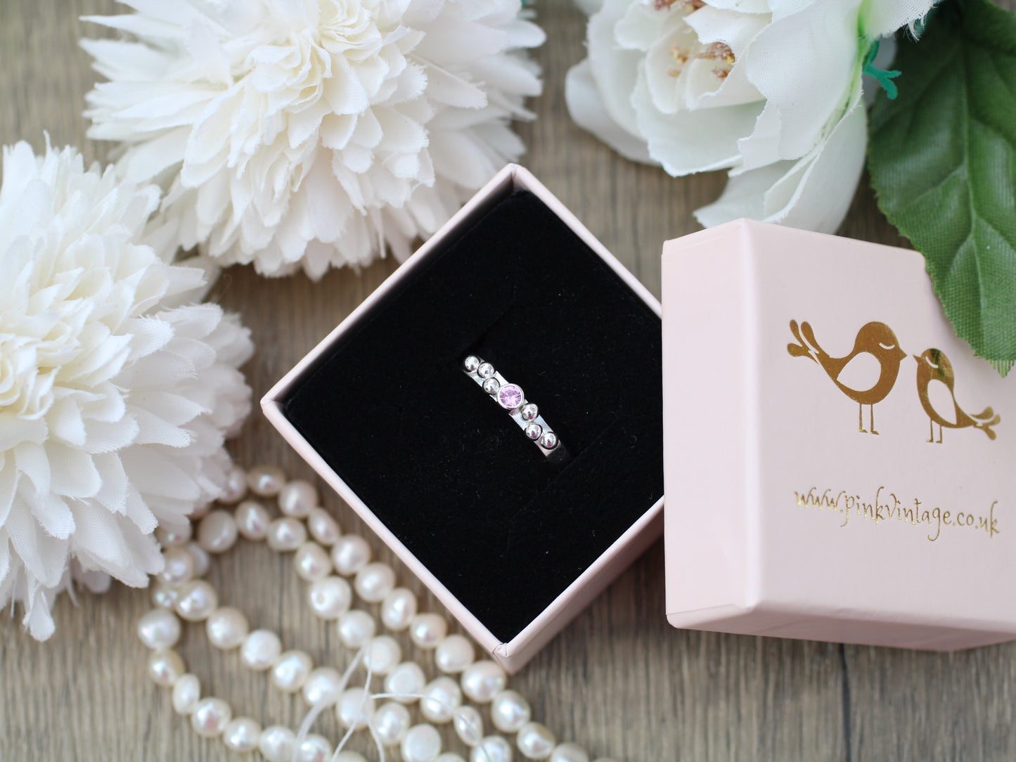 Pink sapphire and granulation ring. September birthstone.