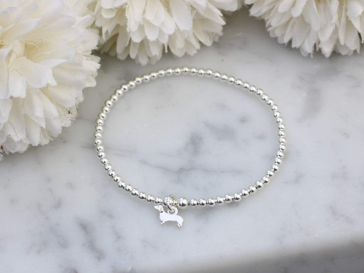 Dachshund bracelet in sterling silver.