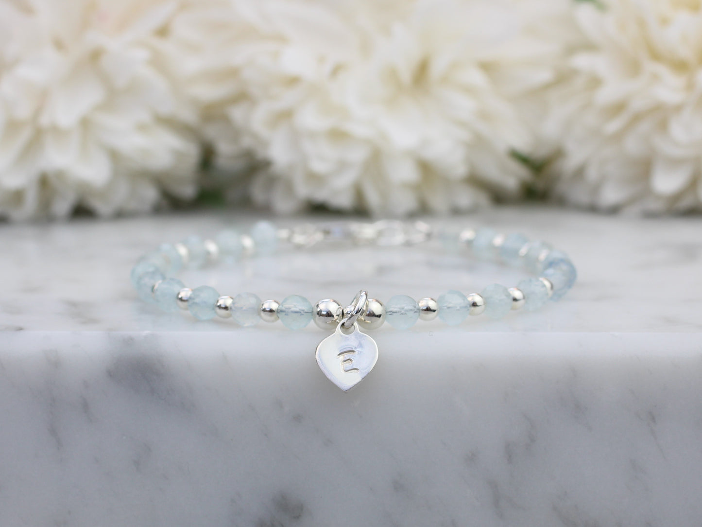 Aquamarine initial bracelet. March birthstone bracelet.