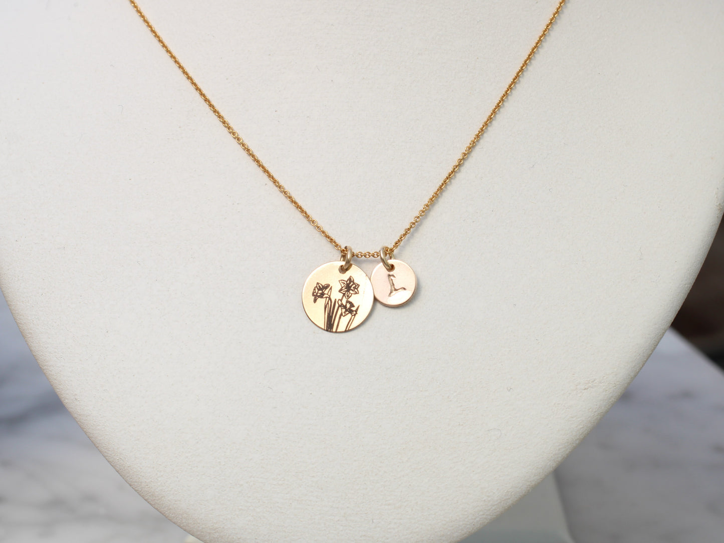 Personalised daffodil necklace in silver or gold.
