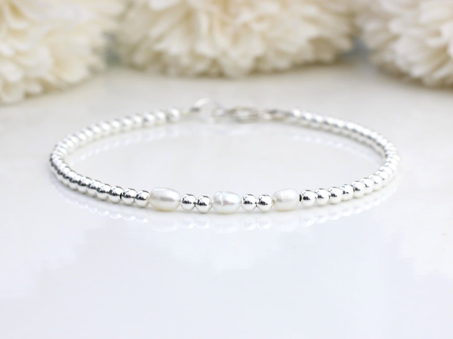 Freshwater pearl milestone bracelet.