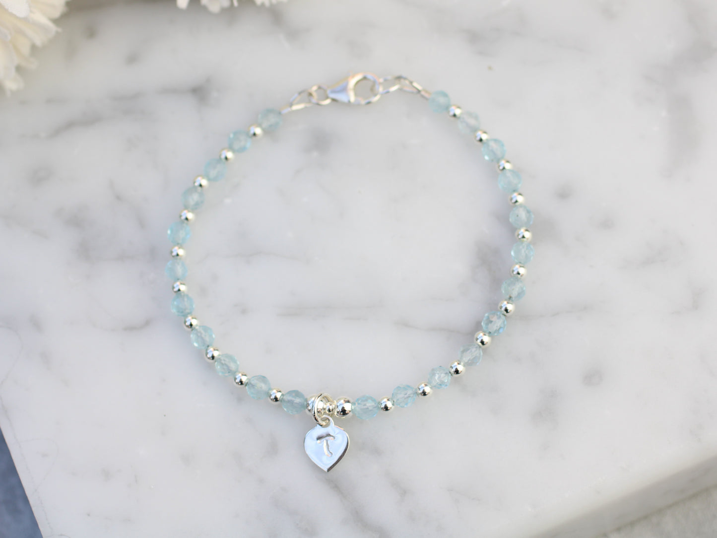 Personalised blue topaz bracelet.