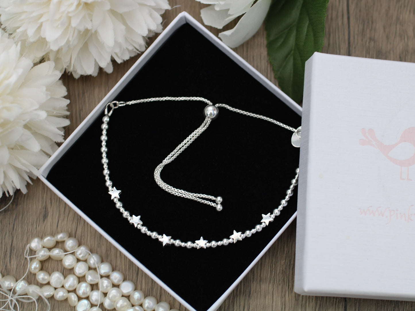60th birthday bracelet. 60th birthday gift. Sterling silver star bracelet with slider clasp.