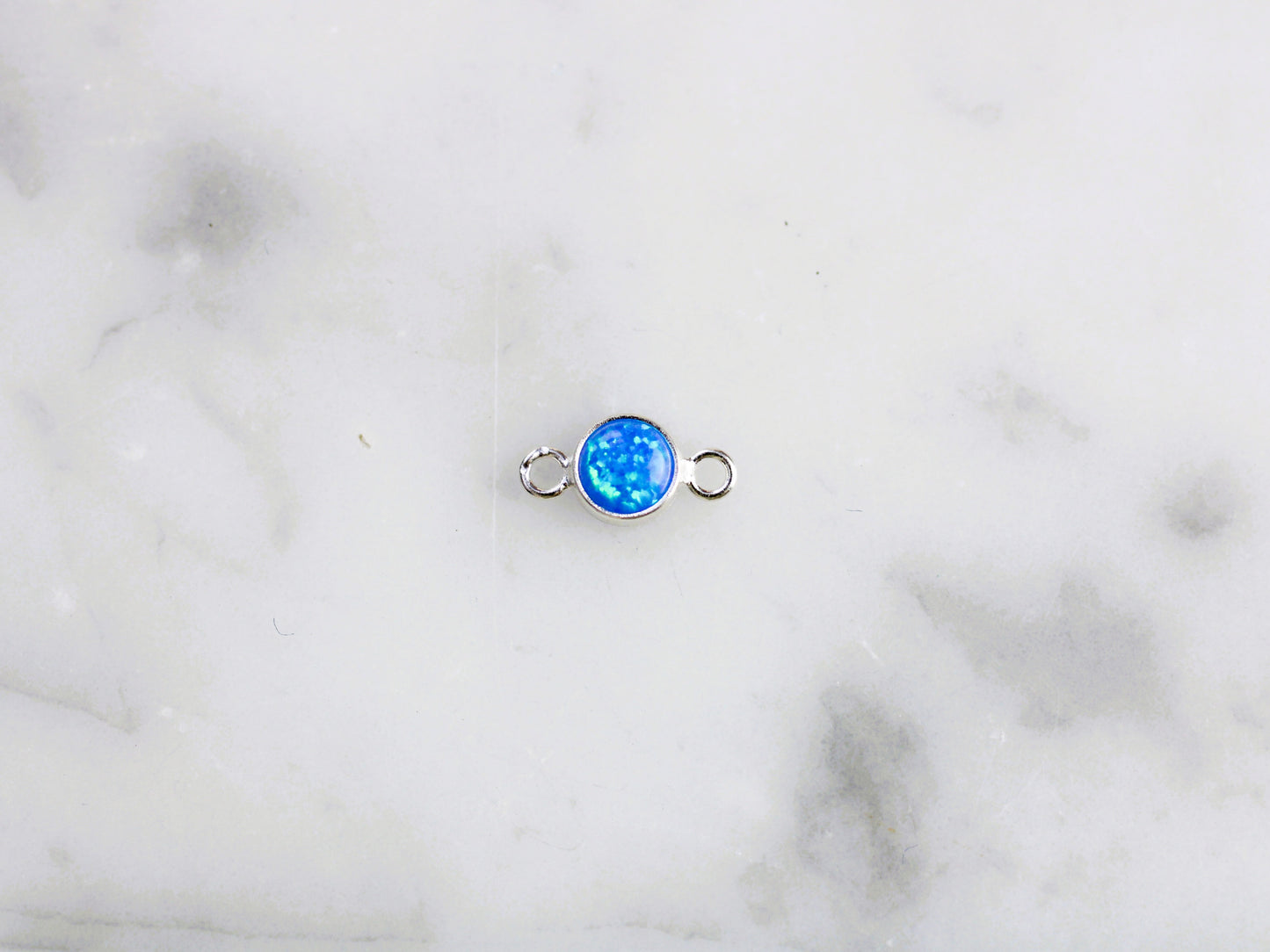 Blue opal connector in sterling silver.