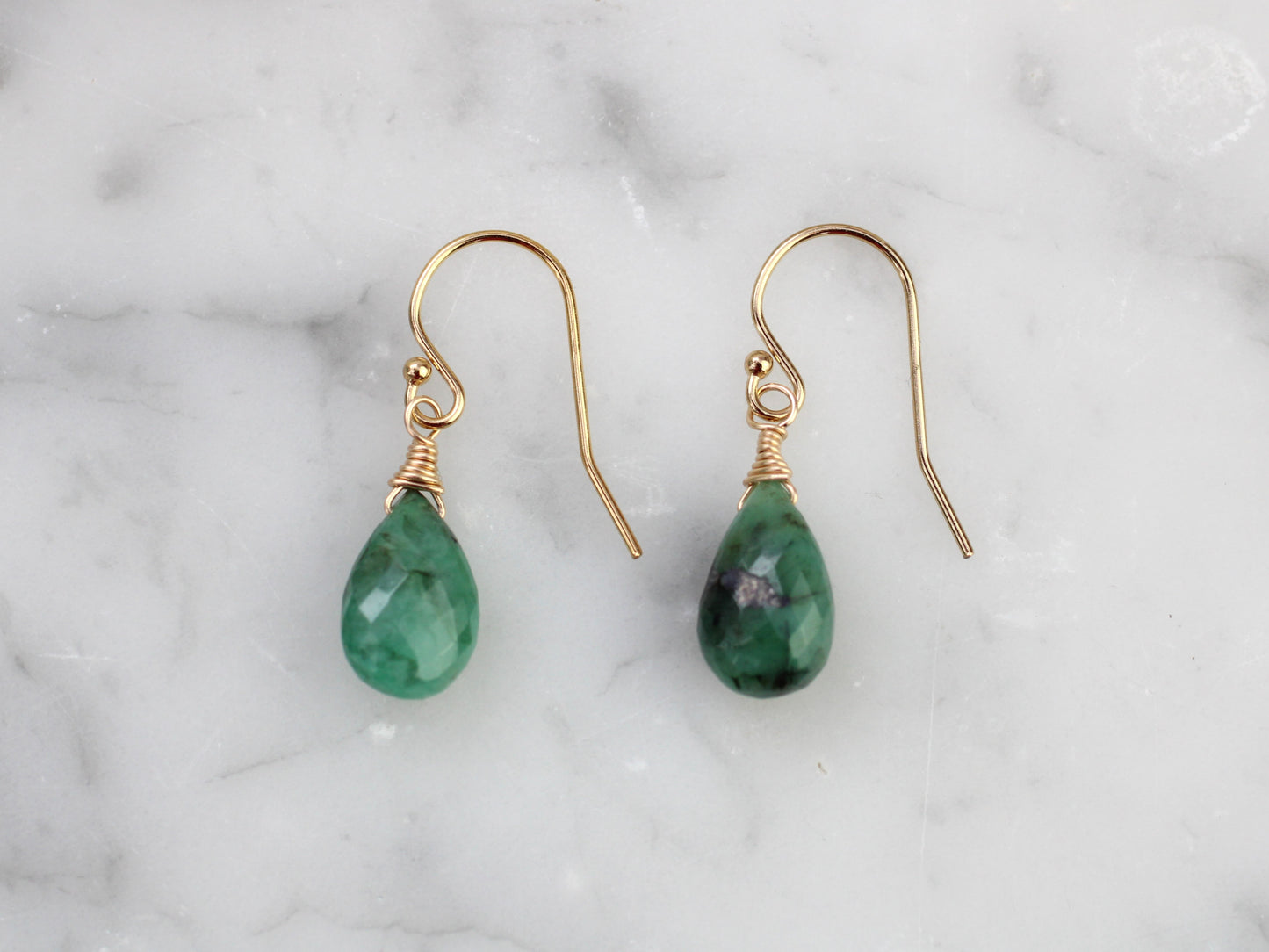 Emerald drop earrings in silver or gold.