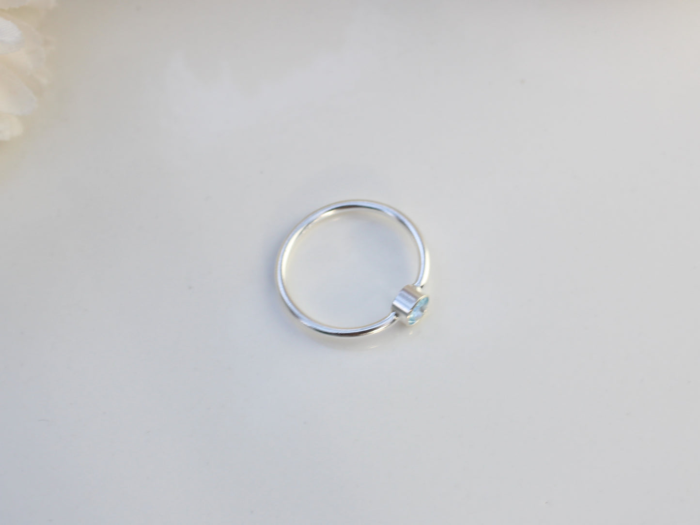 Blue topaz ring in silver. November birthstone ring.