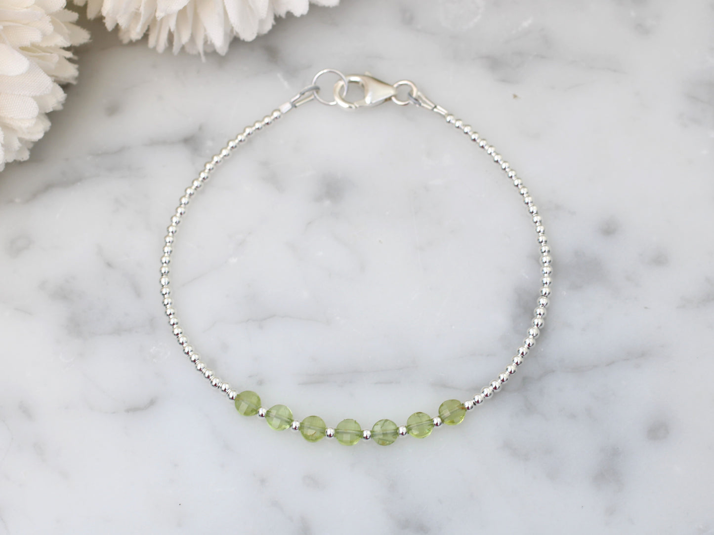 Peridot bead bracelet in sterling silver.